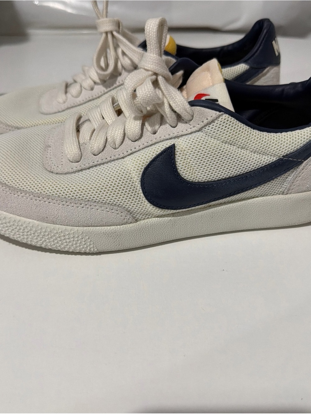 Nike Cream and Navy Low-Top Sneakers with Yellow Tongue Accent